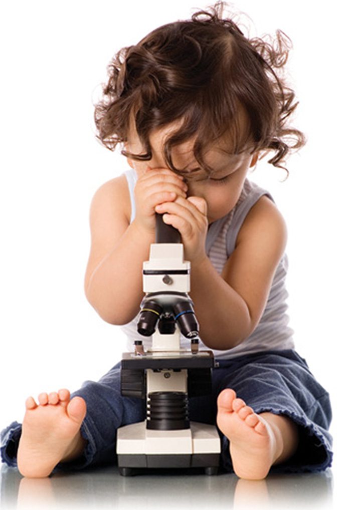 Child with Microscope